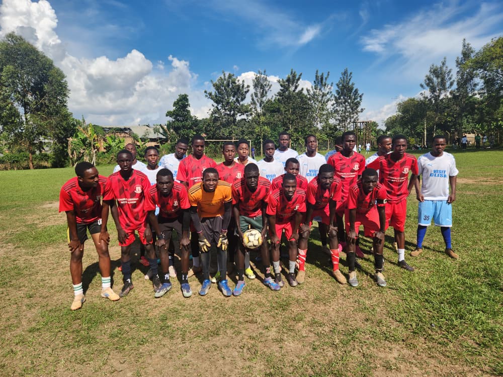 Both teams posing together before a match